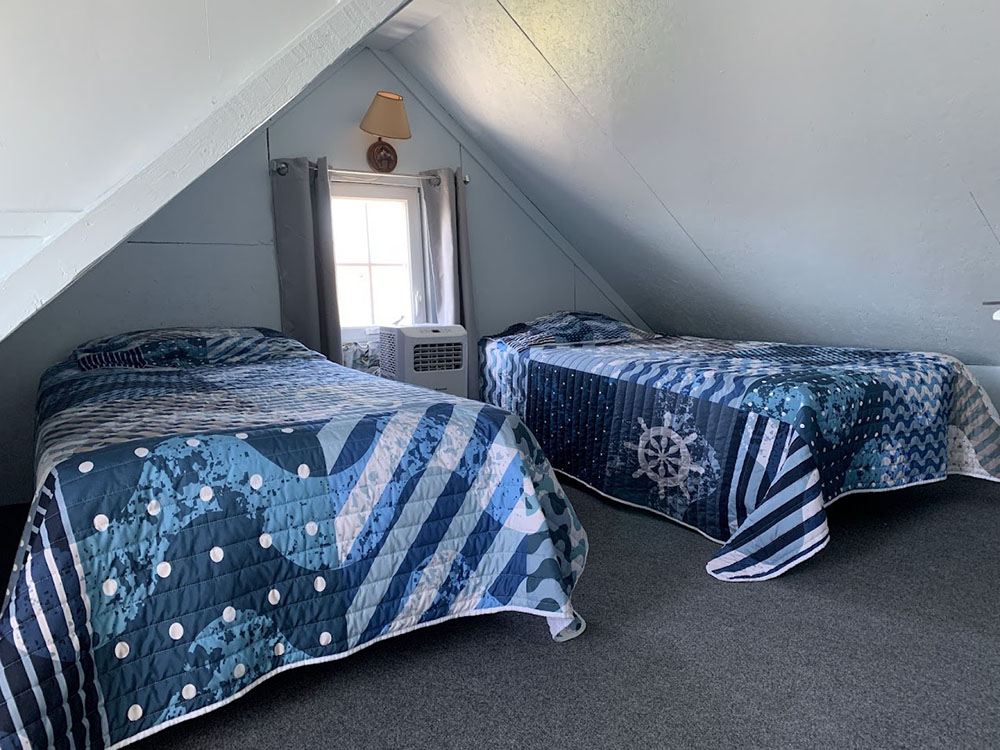 Bedroom three with two single beds