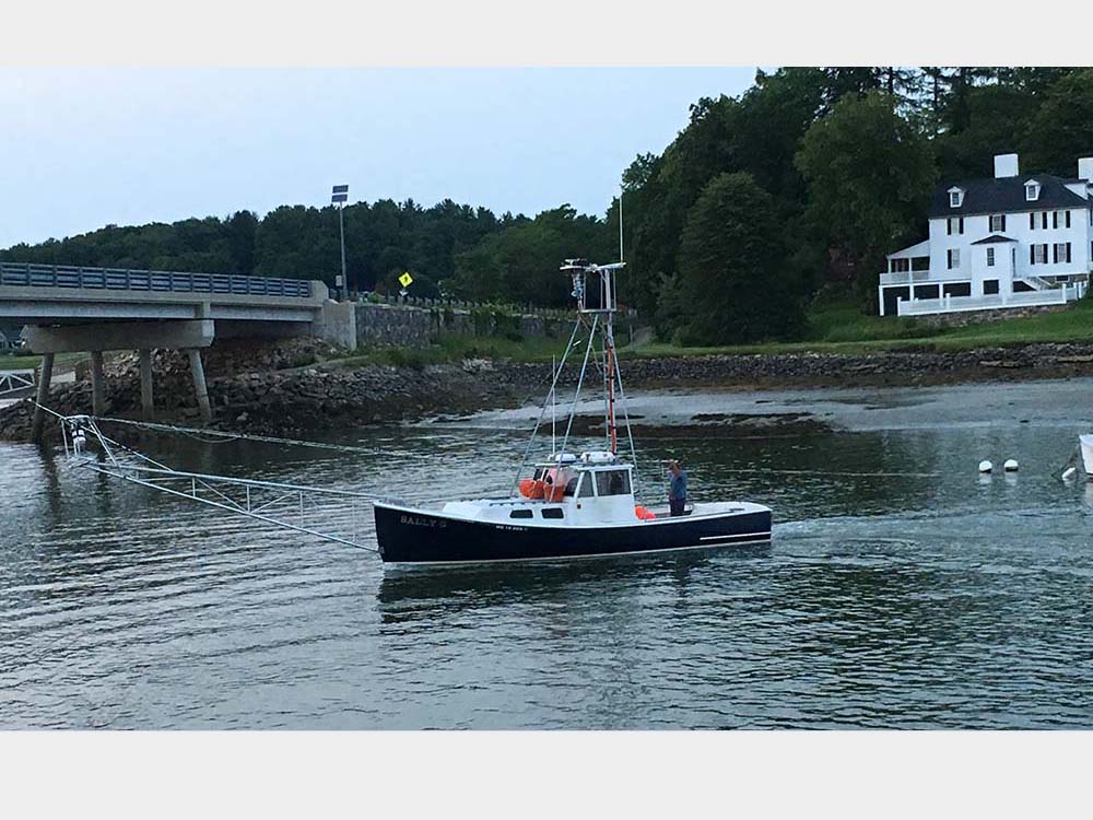 York Harbor ~ Sally G tuna boat returning to dock with catch.